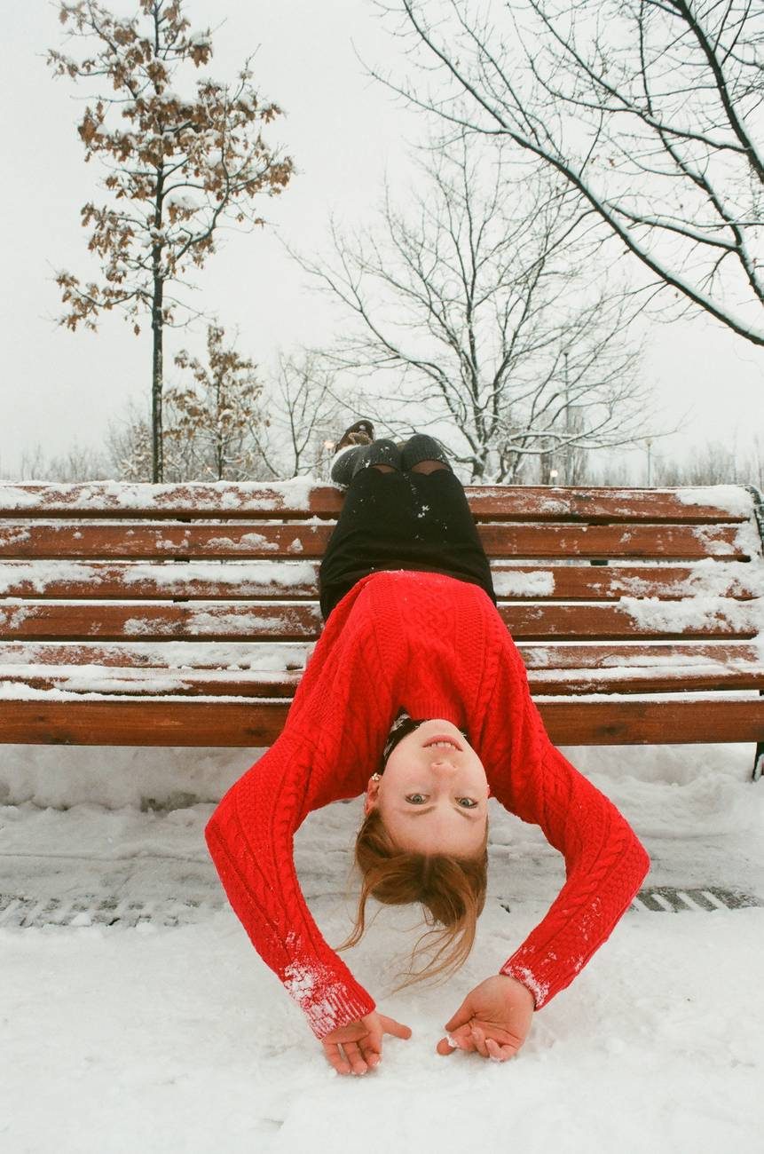 girl sitting on bench